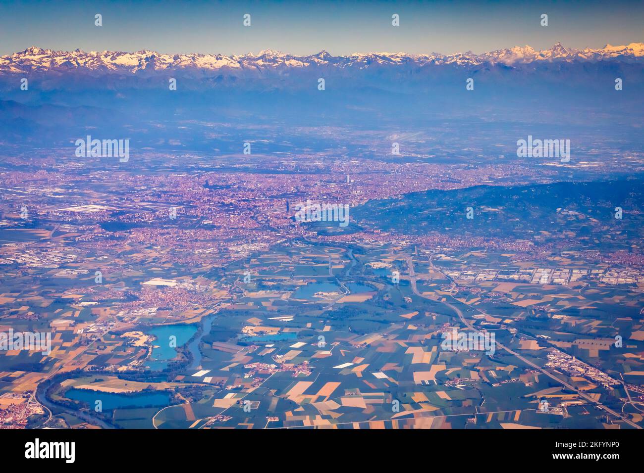 Panoramic aerial view of Turin and snowcapped mountains in Piedmont, Italy Stock Photo