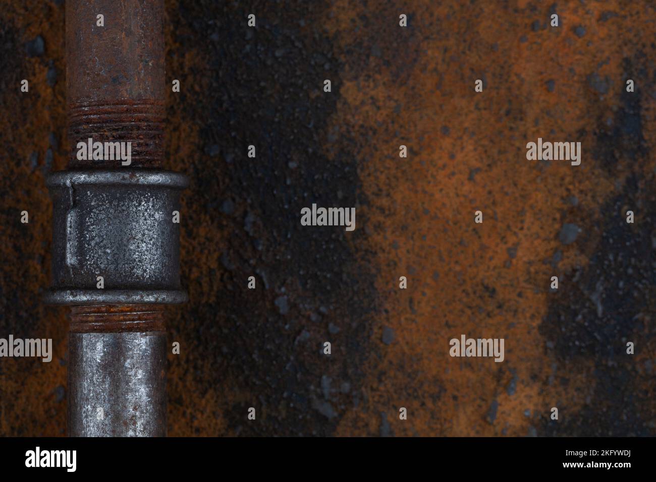 Old rusty valve pipes on rusty metal wall background Stock Photo - Alamy