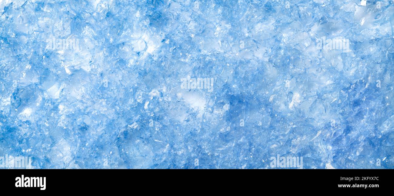 Texture of melting blue frosted ice. Cold or frozen winter background