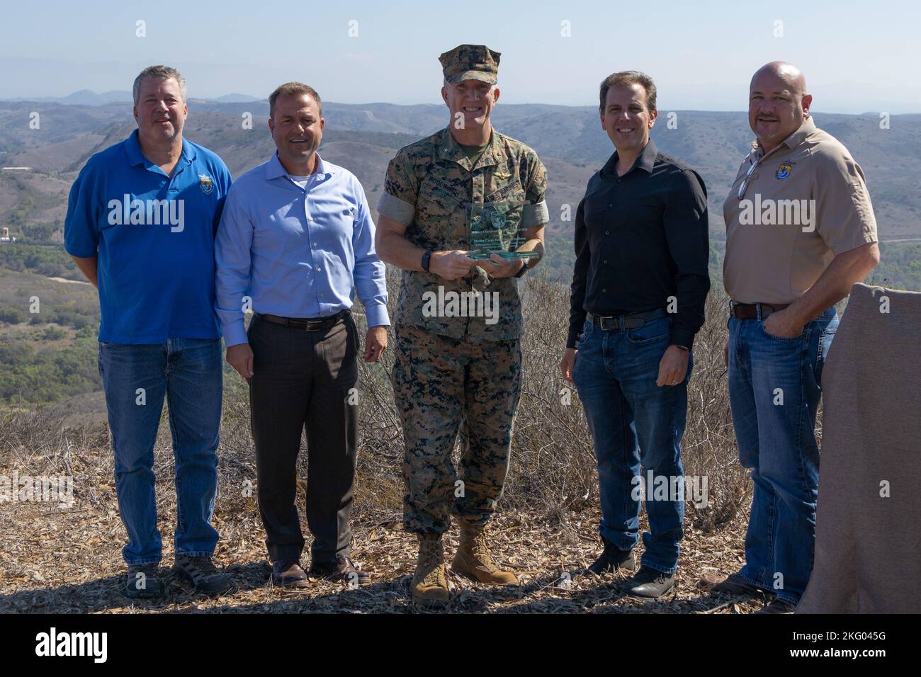 U.S. Marine Brig. Gen. Jason Woodworth, center, the commanding general
