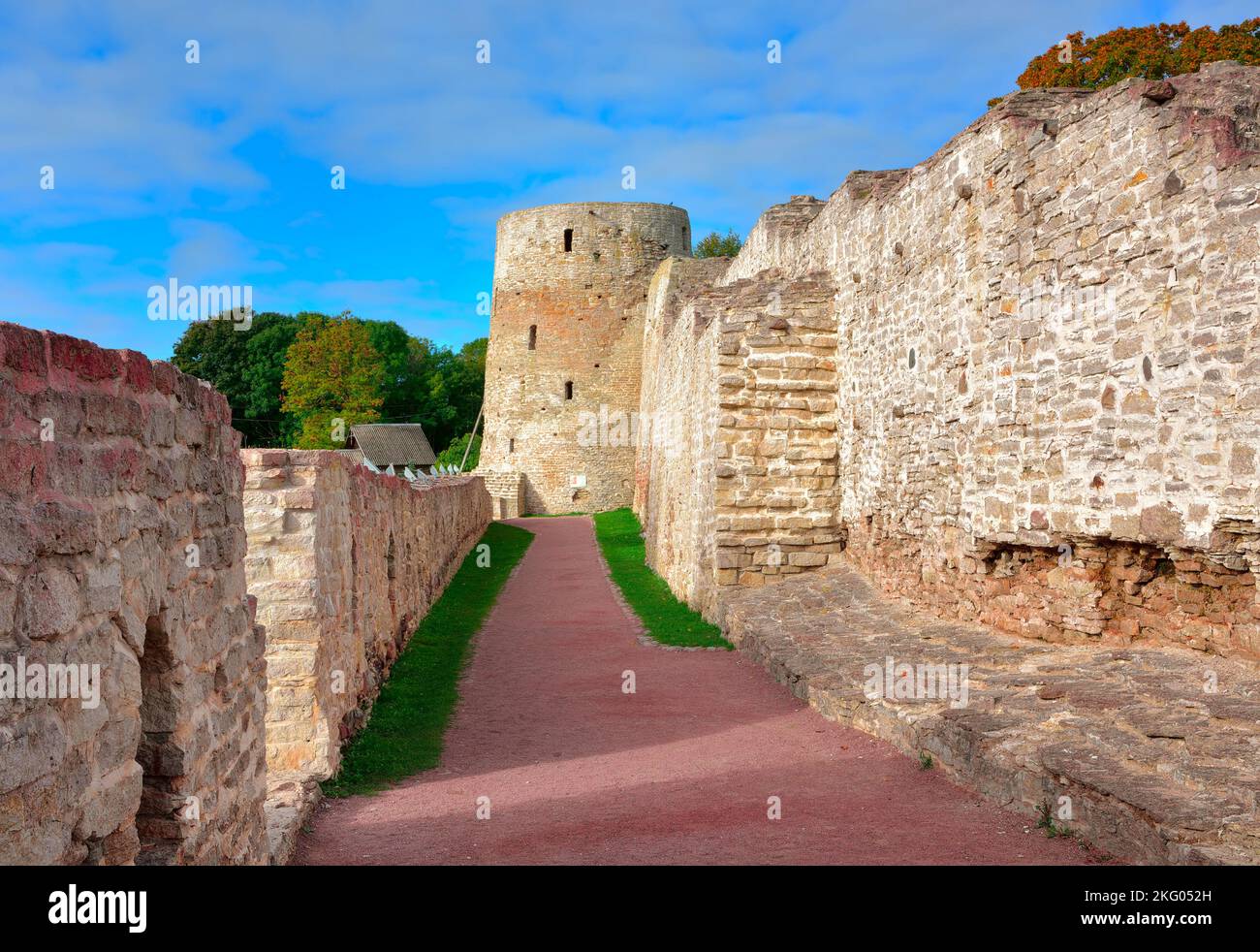 The old stone Izborskaya fortress. Defensive corridor at the fortress walls, an architectural monument of the XIV-XVII century. Izborsk, Pskov region, Stock Photo