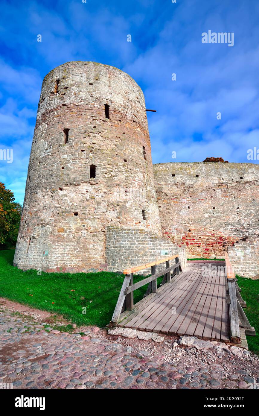 The old stone Izborskaya fortress. The bridge at the Temnushka Tower, an architectural monument of the XIV-XVII century. Izborsk, Pskov region, Russia Stock Photo