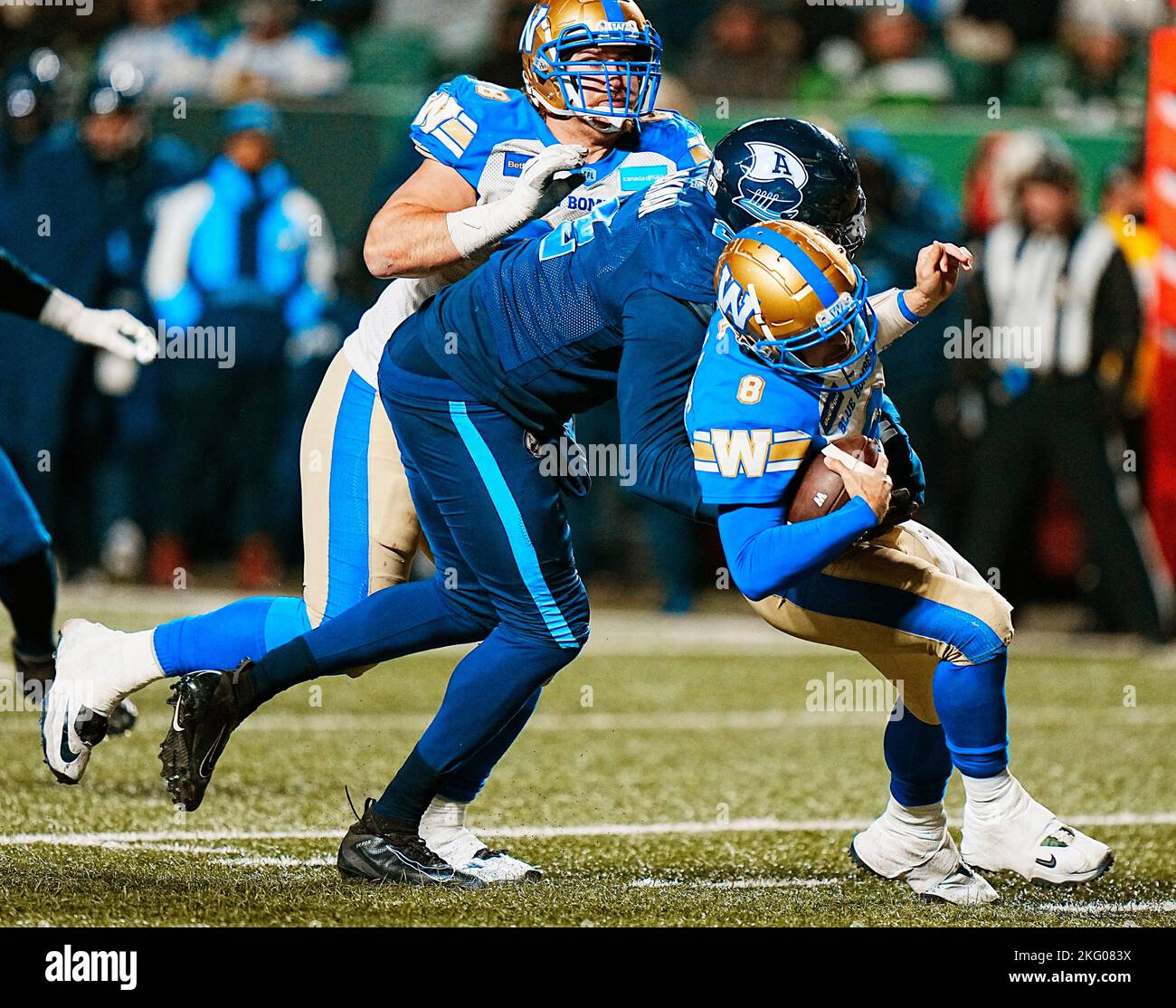 Toronto Argonauts defensive lineman Shawn Oakman (2) tackles Winnipeg