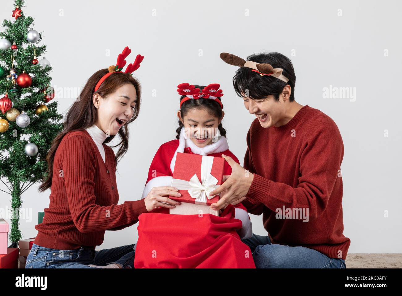 happy Asian Korean family in Christmas concept surprised at gifts Stock ...