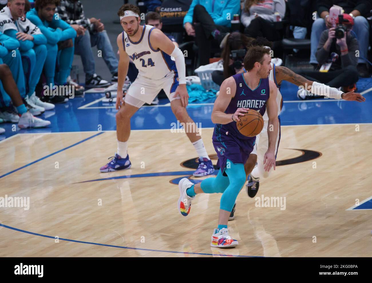 Charlotte Hornets forward Gordon Hayward (20) brings the ball up court  against the Washington Wizards during the first half of an NBA basketball  game in Charlotte, N.C., Wednesday, Nov. 17, 2021. (AP