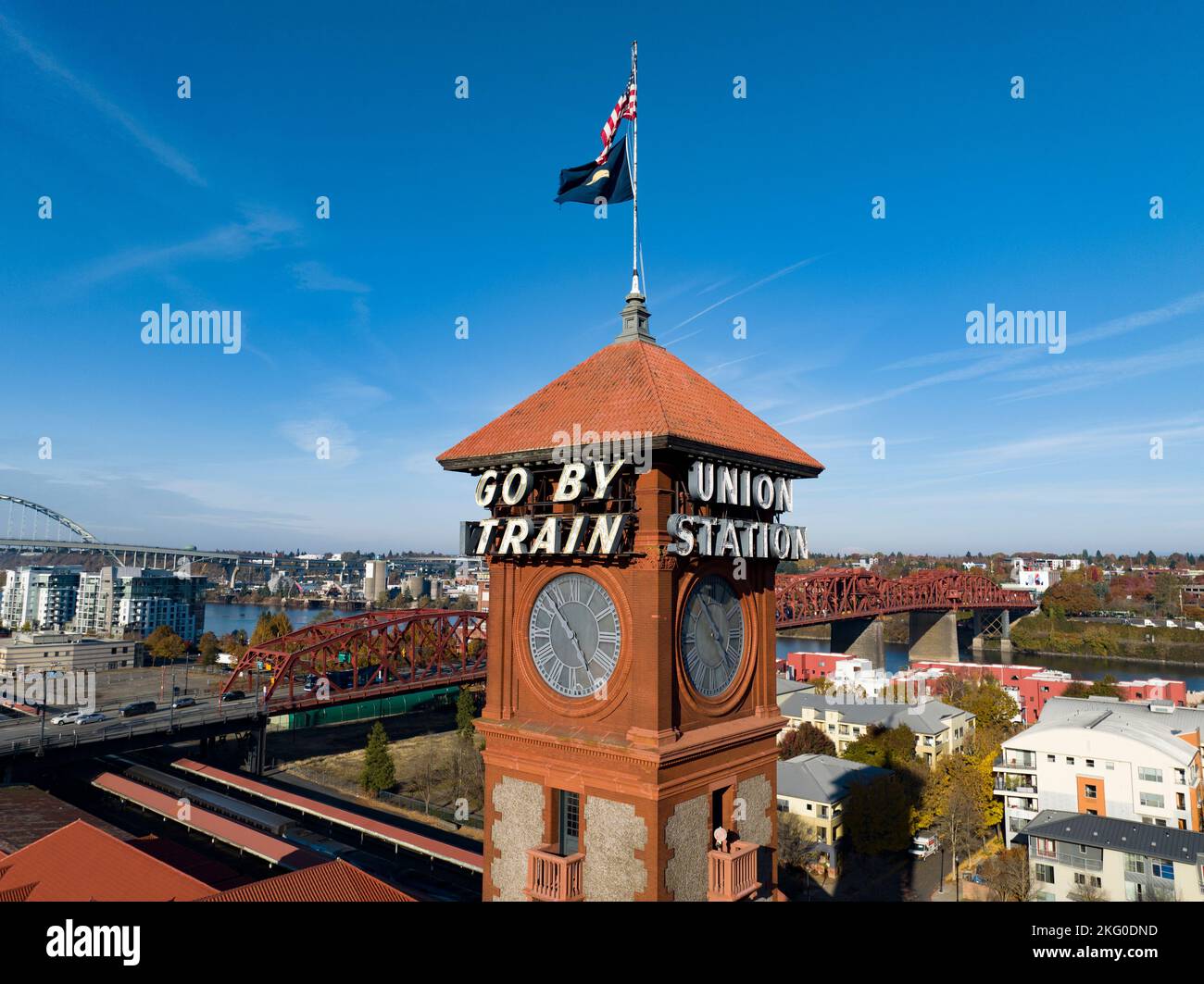 Union Station passenger railway station with sign on tower saying 'Go By Train' and 'Union Station'. Stock Photo