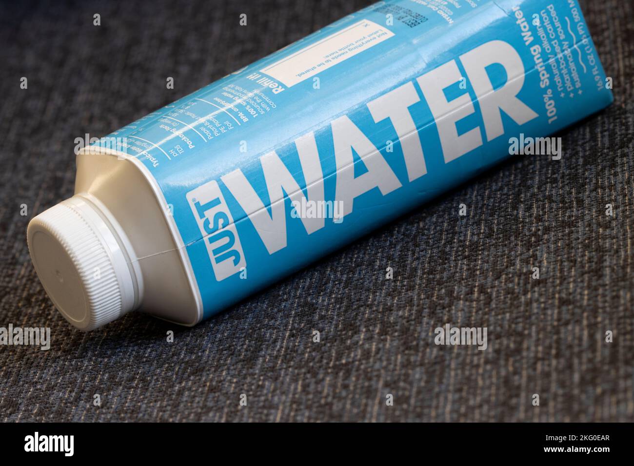 Closeup of a bottle of Just Water. The company claims that the product is natural mountain-sourced spring water from Montana. Stock Photo
