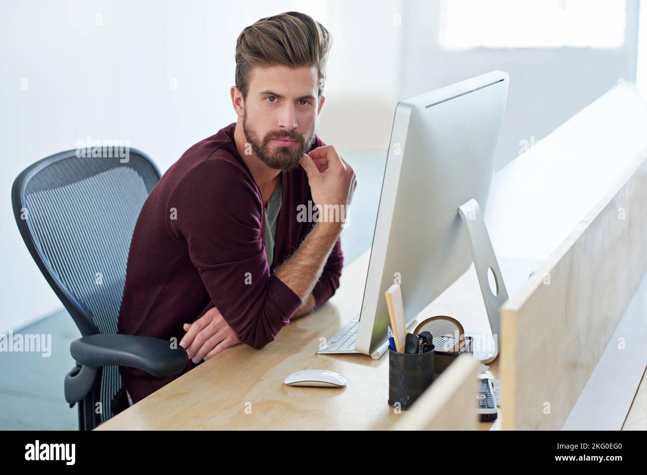 Hes one focused professional. a designer at work in an office. Stock Photo