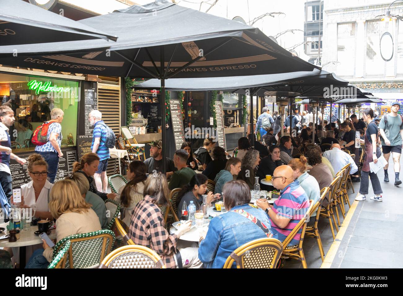 Melbourne laneway, Victoria, people eating and dining at cafes and restaurants in Degraves street, Melbourne city centre,Australia Stock Photo