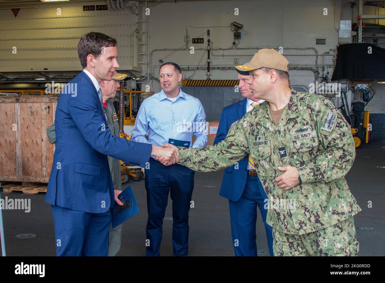 SAN DIEGO (Oct. 20, 2022) – Capt. Matthew Cieslukowski, commanding officer of USS Boxer (LHD 4), shakes hands with Trevor Smith, Legislative Director for Rep. Kevin McCarthy, following a ship familiarization tour. Boxer is a Wasp-class amphibious assault ship home ported in San Diego. Stock Photo