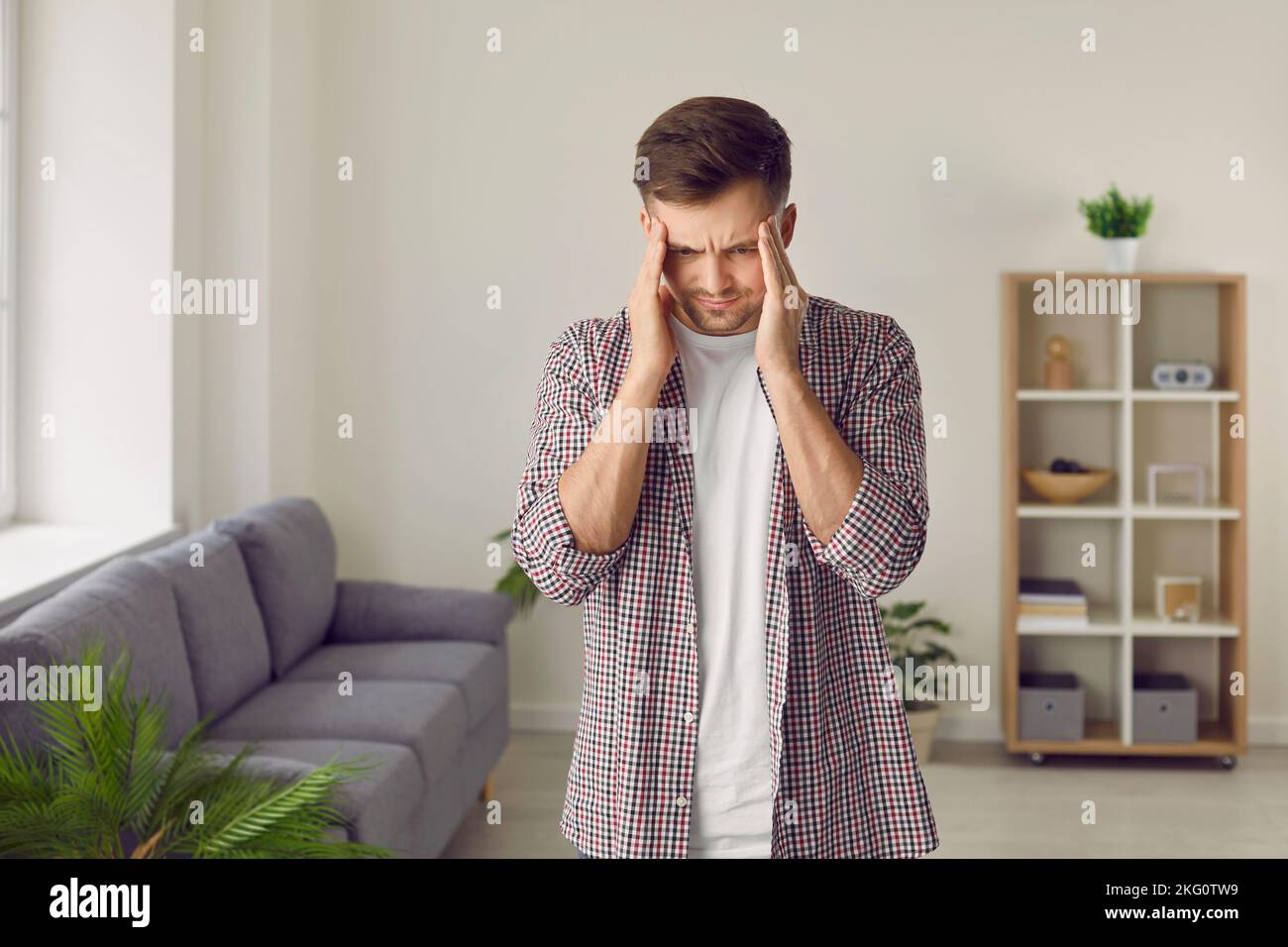 tired-stressed-nervous-worried-young-man-suffering-from-an-intense