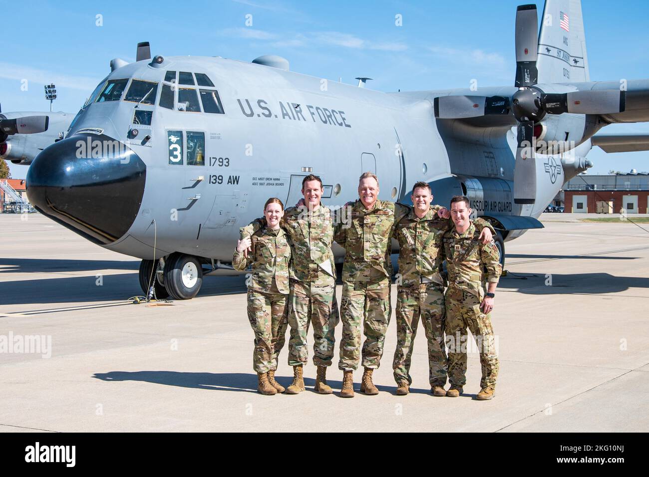 From left: Tech. Sgt. Kacie McCullough, Staff Sgt. Braden Bigham, Chief Master Sgt. John Bigham, Capt. Justin Bigham, and Capt. Riley Coats pose for a photo at Rosecrans Air National Guard Base, St. Joseph, Missouri, Oct. 20, 2022. All four of Chief Bigham’s children are currently serving at the 139th Airlift Wing, Missouri Air National Guard. Stock Photo