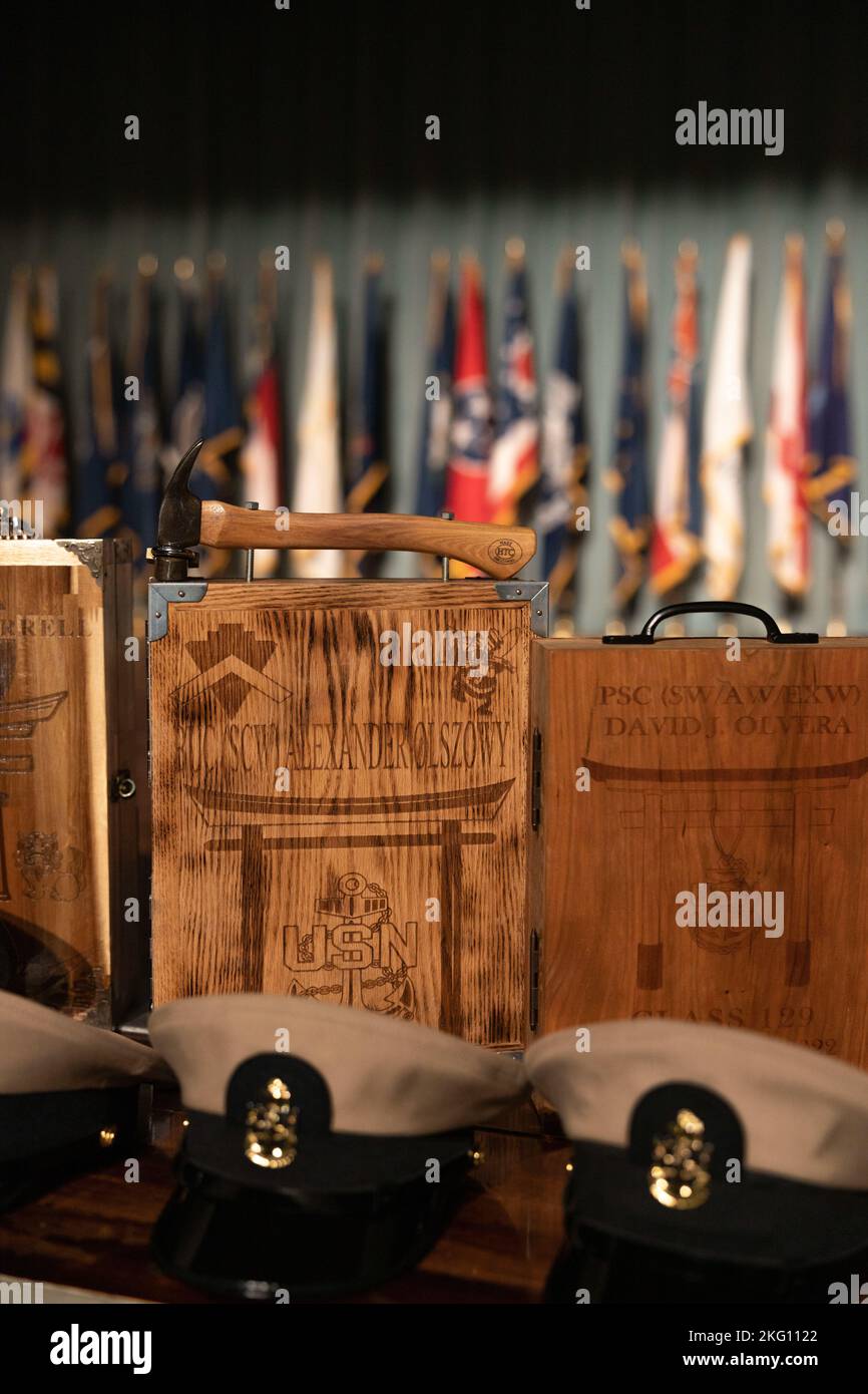 U.S. Navy chief combination covers sit on display at a chief pinning