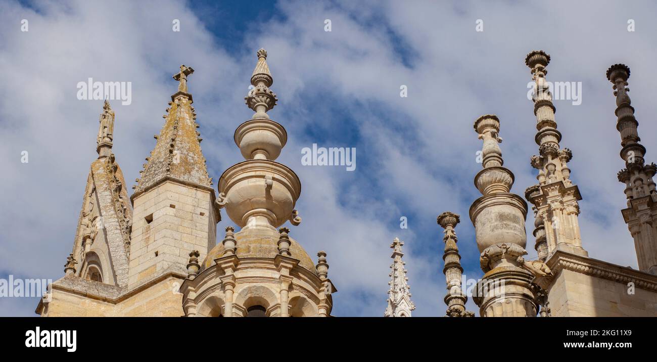 Leon Cathedral stone pinnacles, Spain. Cloudy blue sky as background Stock Photo