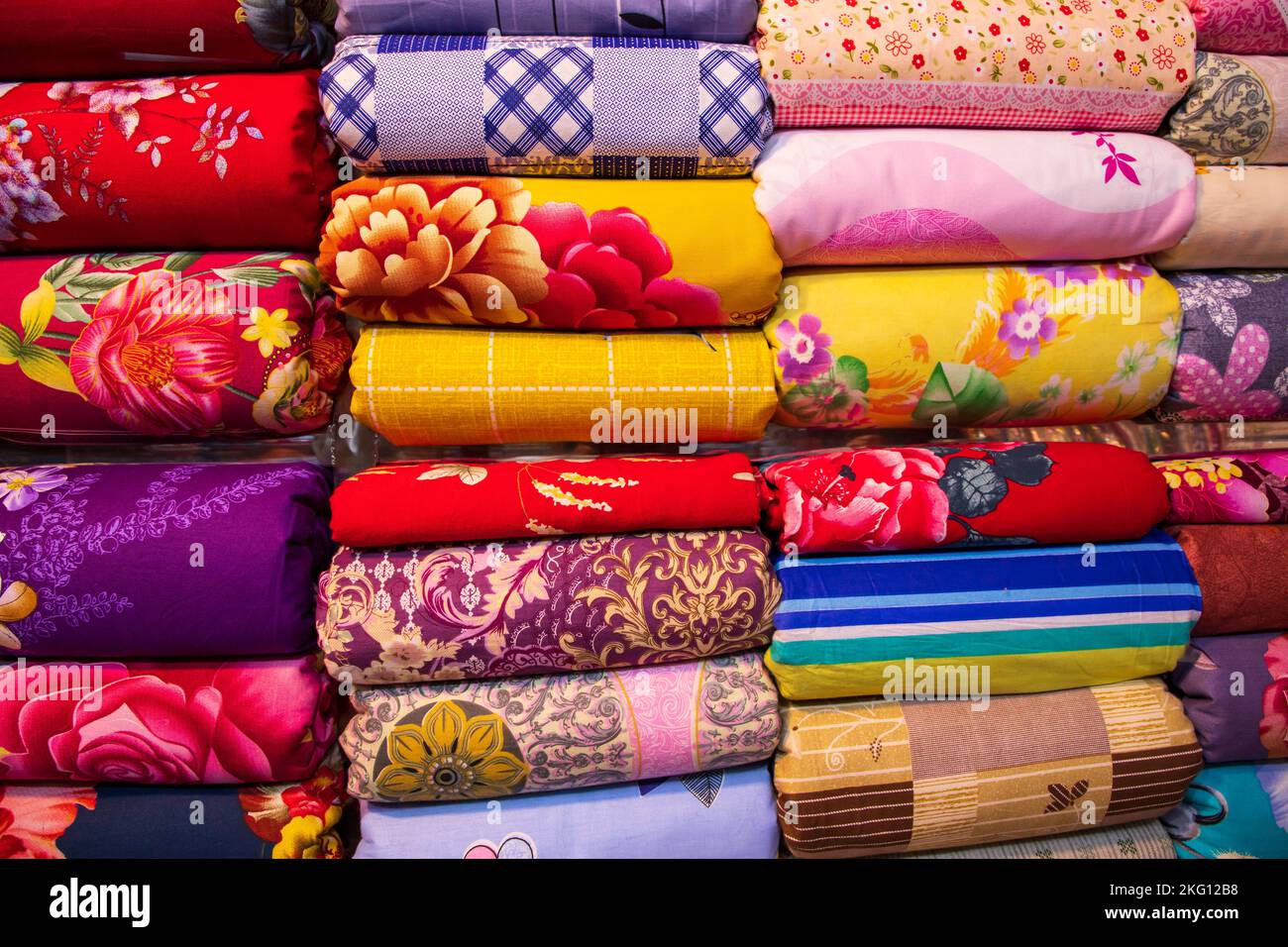 Artistic variety shade tone colors Bed sheets stacked on retail Shop ...