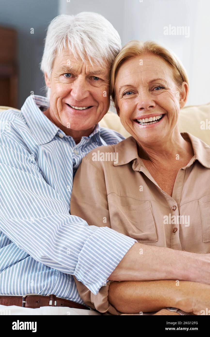 Im never letting you go. Portrait of a loving husband embracing his wife. Stock Photo