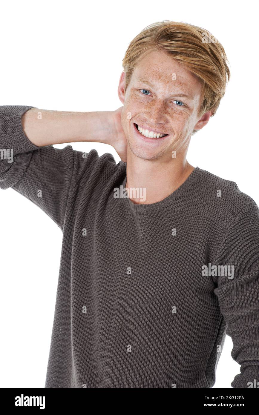 Feeling confident and looking casual. Studio portrait of a handsome young man with ginger hair. Stock Photo