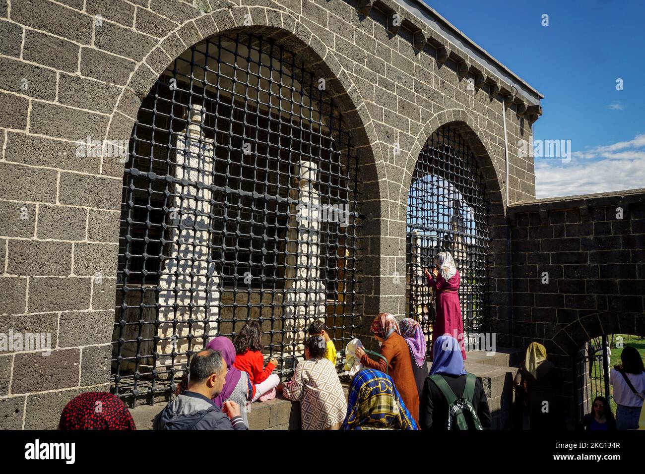 A group of people visiting the Tomb of 27 Companions of the Prophet Sulaiman in Diyarbakir Stock Photo