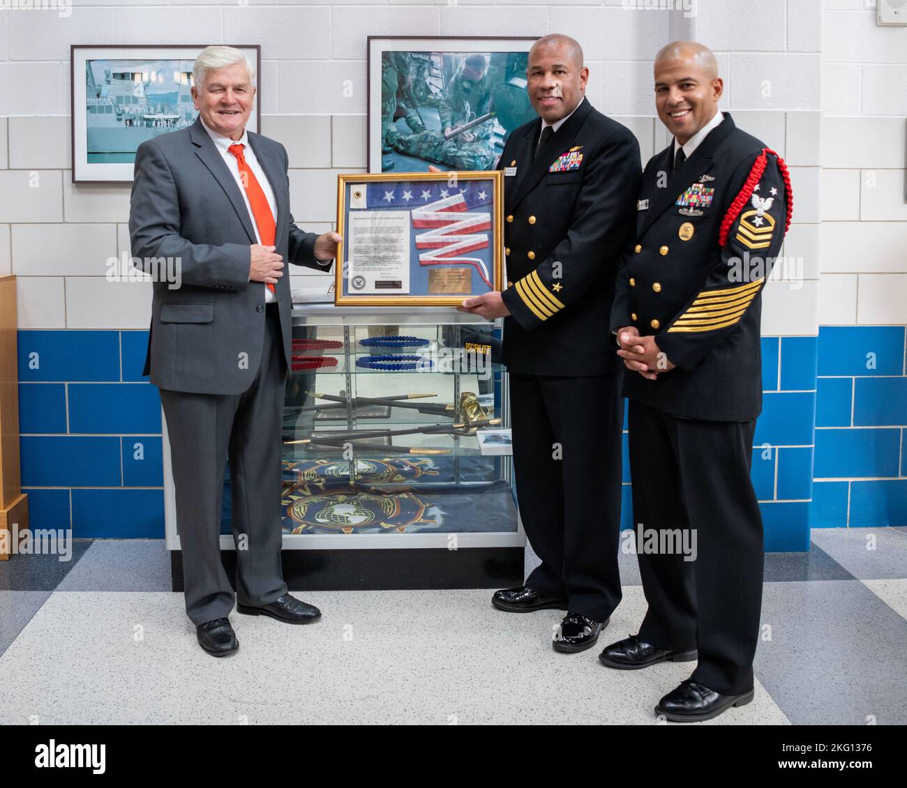 The 8th Master Chief Petty Officer of the Navy, John Hagan, donates