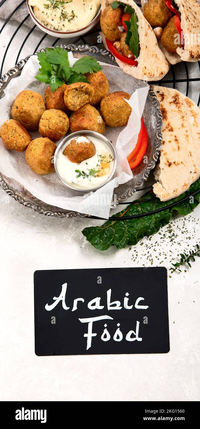 Middle eastern, arabic dishes with falafel, hummus, pita. Halal food