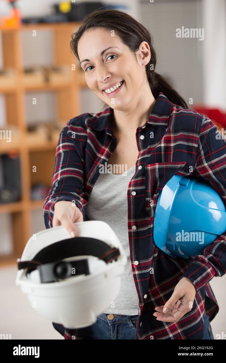 Woman engineer wearing yellow helmet hi-res stock photography and ...