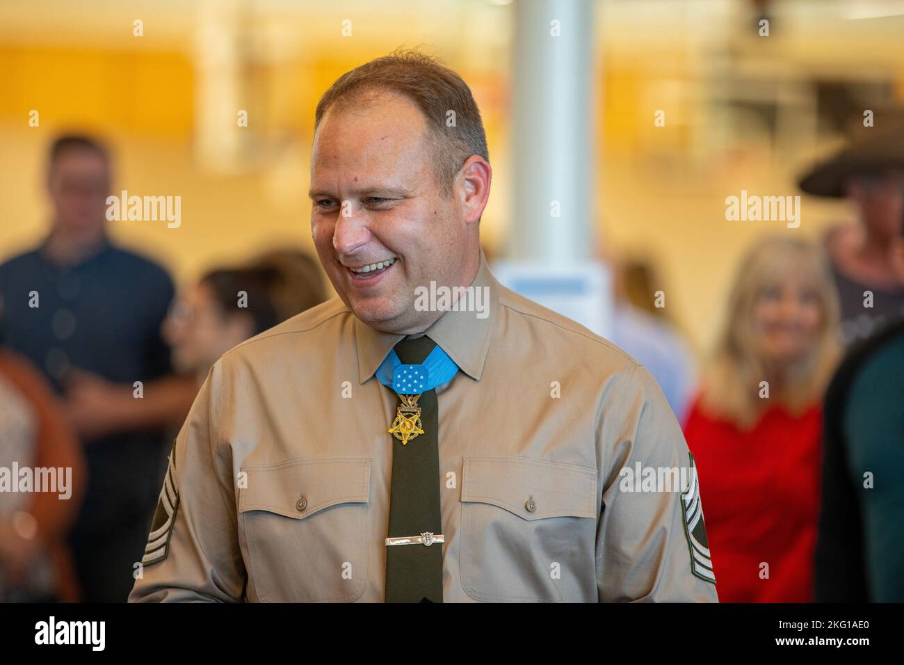 Master Sgt. Earl Plumlee, a Medal of Honor recipient, greets friends and family during an event at the city's new activity complex honoring Plumlee in Elk City, Oklahoma, Oct. 21, 2022. Plumlee, a native Oklahoman, toured his home state Oct. 18-22. During the event, Plumlee spoke to Elk City High School students about his experiences in the Army. (Oklahoma National Guard photo by Spc. Haden Tolbert) Stock Photo