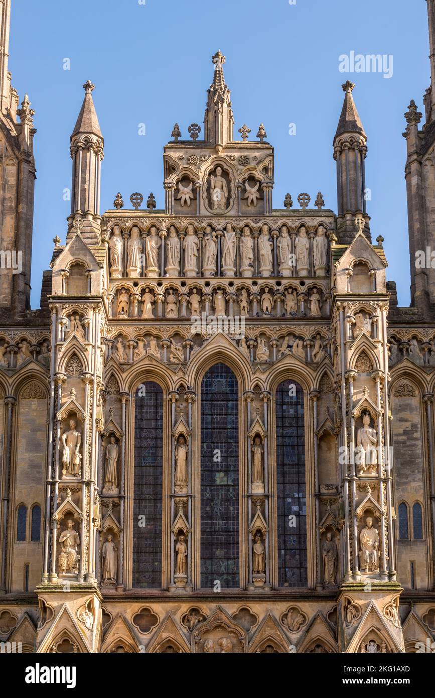 The West Front of Wells Cathedral, Somerset, completed in 1365 in Early English Gothic style. Many of the sculptures were damaged during the Civil War Stock Photo