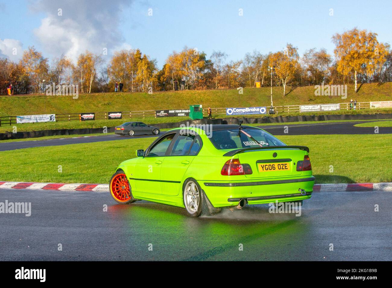 2006 Green BMW 3 Series 530D SE 2993cc Diesel 6 speed manual; Rear-wheel-drive car, driving on drift tracks and high-speed cornering on wet roads on a Three Sisters Drift Day in Wigan, UK Stock Photo