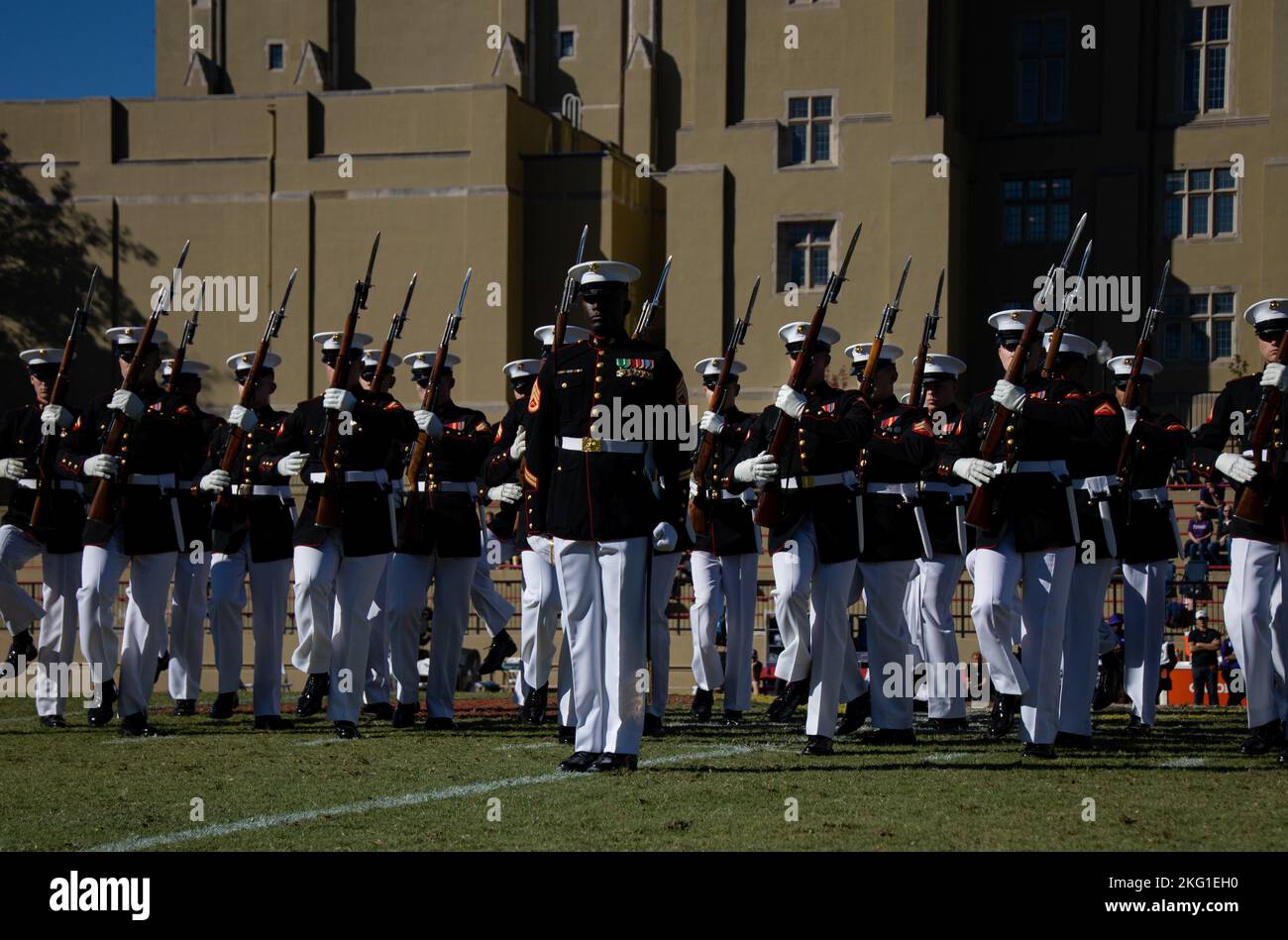 Marines with “The Silent Drill Platoon,” Marine Barracks Washington, perform during a Virginia Military Institute football game at Lexington, Va., Oct 22, 2022. The Marines performed for thousands of cadets and family members attending the game, demonstrating the professionalism of the United States Marine Corps. Stock Photo