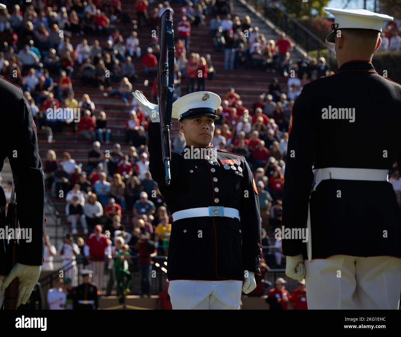 Cpl. Steven A. Almaguer, number one rifle inspector, with “The Silent Drill Platoon,” Marine Barracks Washington, conducts a “rifle inspection” sequence during a Virginia Military Institute football game at Lexington, Va., Oct 22, 2022. The Marines performed for thousands of cadets and family members attending the game, demonstrating the professionalism of the United States Marine Corps. Stock Photo