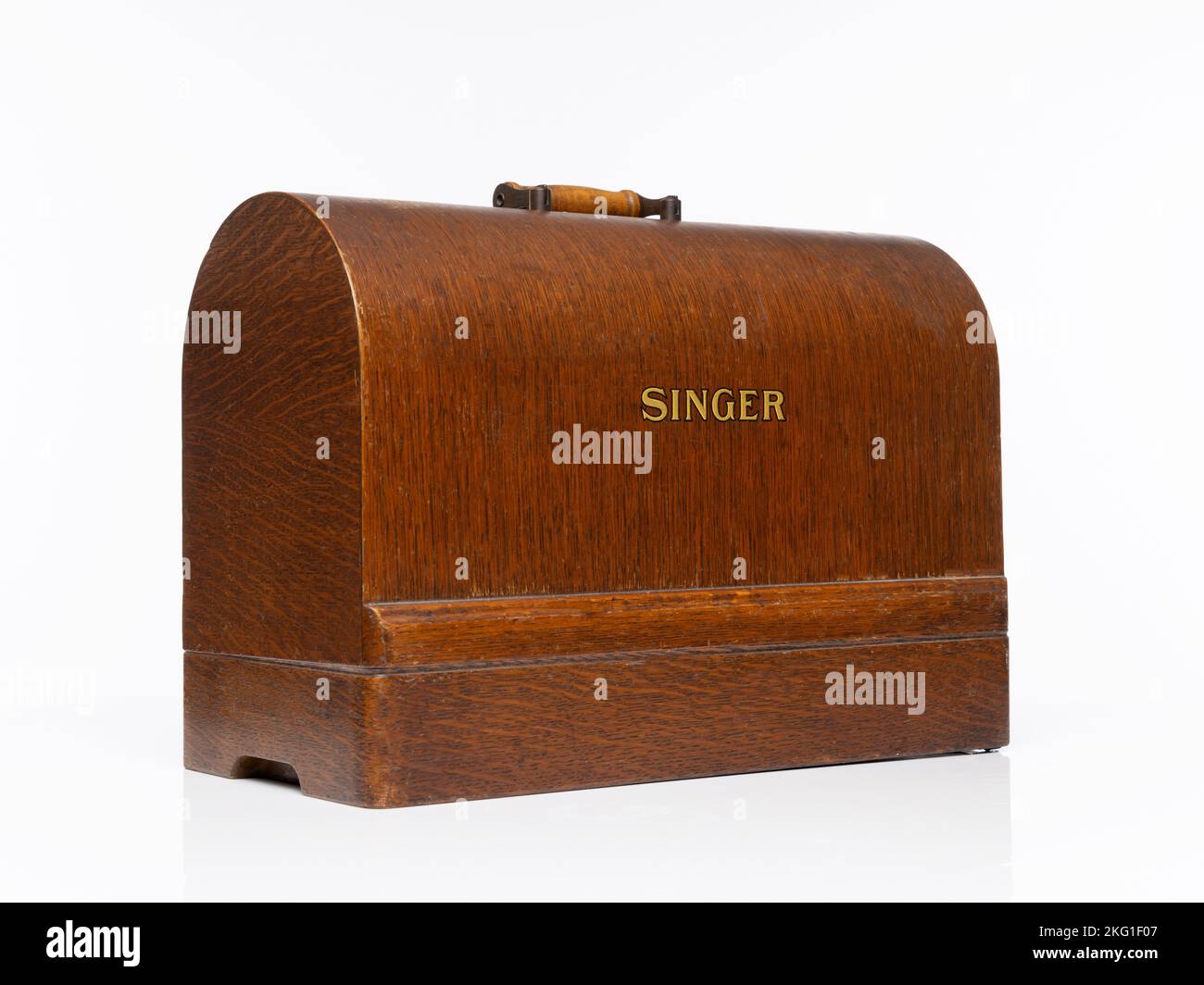 Isolated vintage wooden carry case for a Singer 99k Sewing Machine Stock Photo