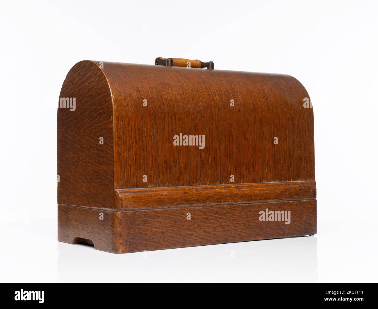Isolated vintage wooden carry case for a Singer Sewing Machine Stock Photo