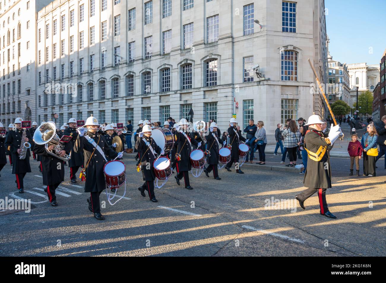 Drum Major leads the Royal Marines marching band in the procession for