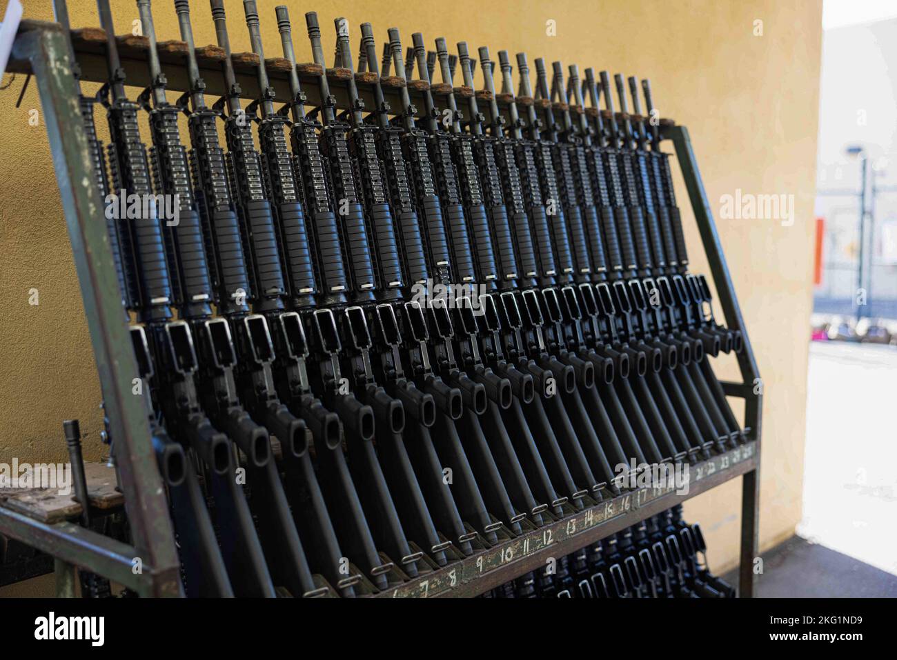 M16A4 service rifles are displayed on a rack for recruits with Lima ...