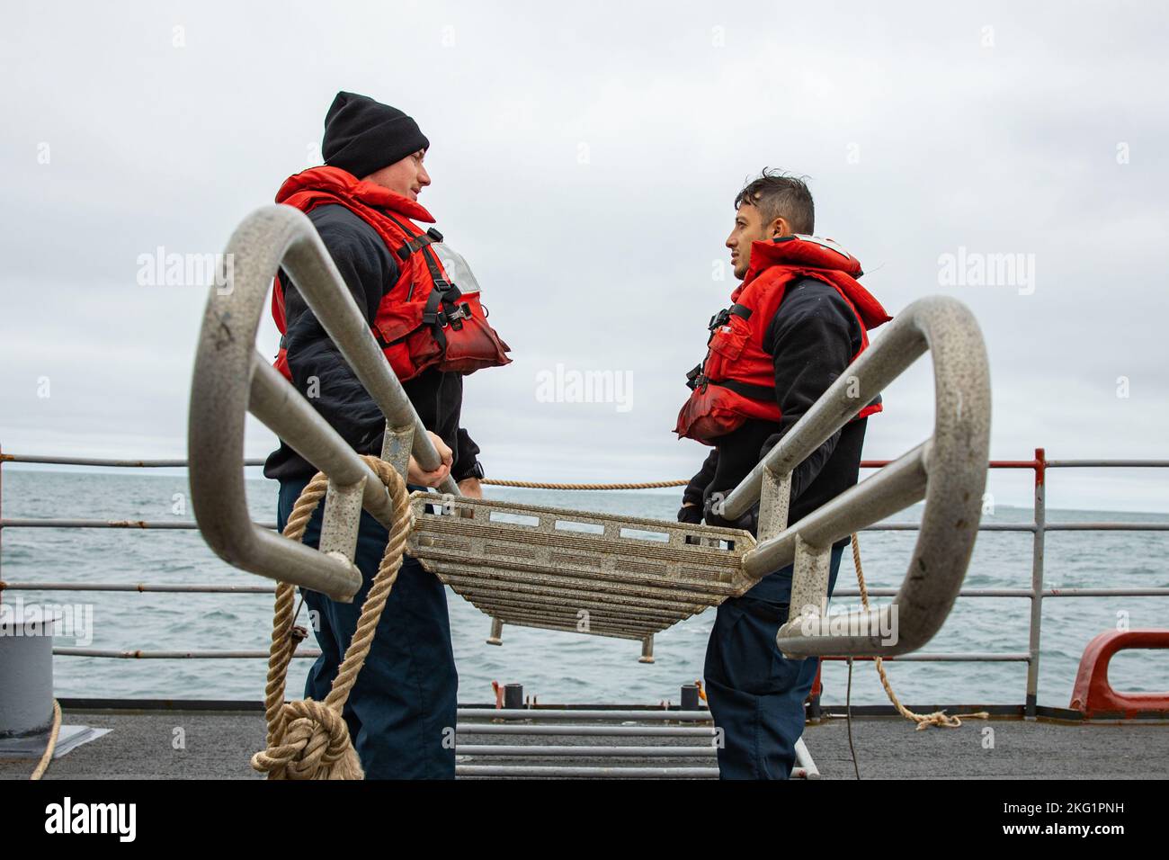 221024NLK6471023 ATLANTIC OCEAN—Seaman Gavin Guenther, left, and Boatswain’s Mate 3rd Class
