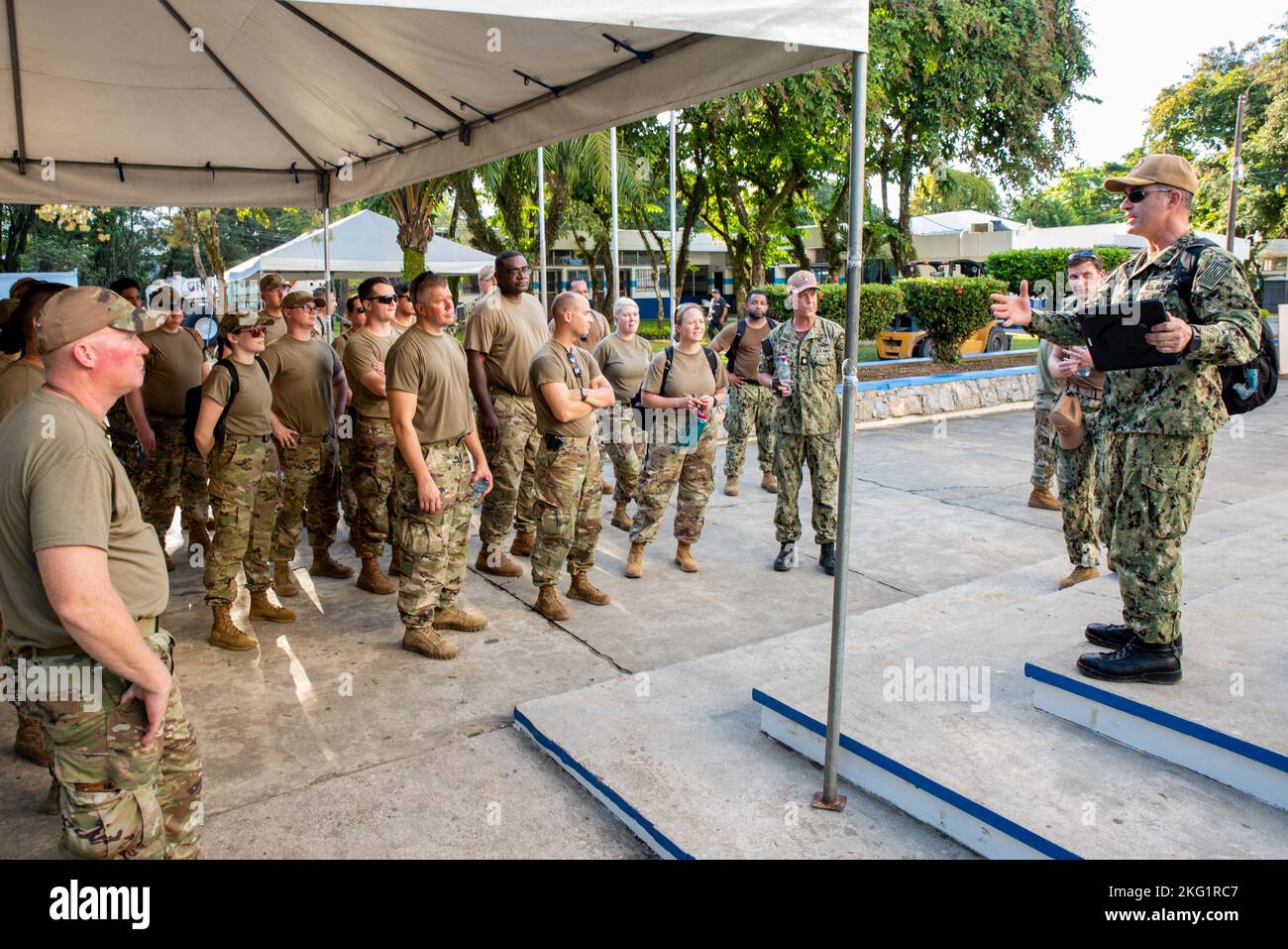 Navy Capt. Austin Parker briefs 188th and 189th Wing members during ...