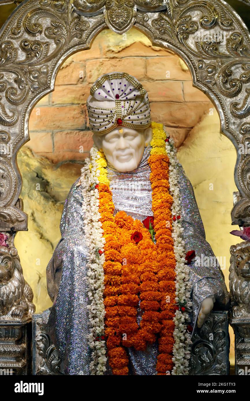 Shiva hindu temple. Statue of Indian Spiritual master Shirdi Sai ...