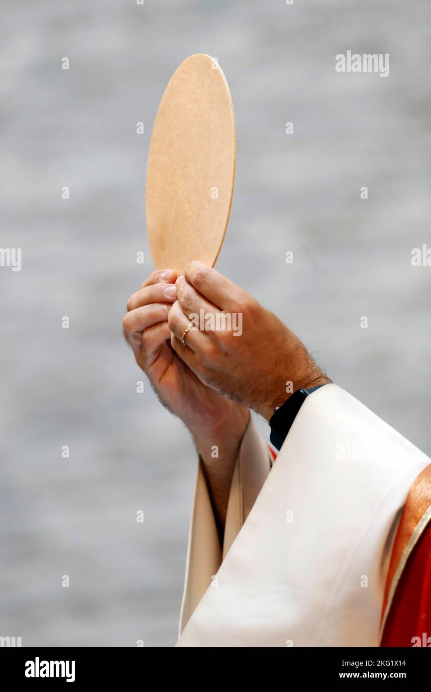 Priest raising the host. Switzerland Stock Photo - Alamy