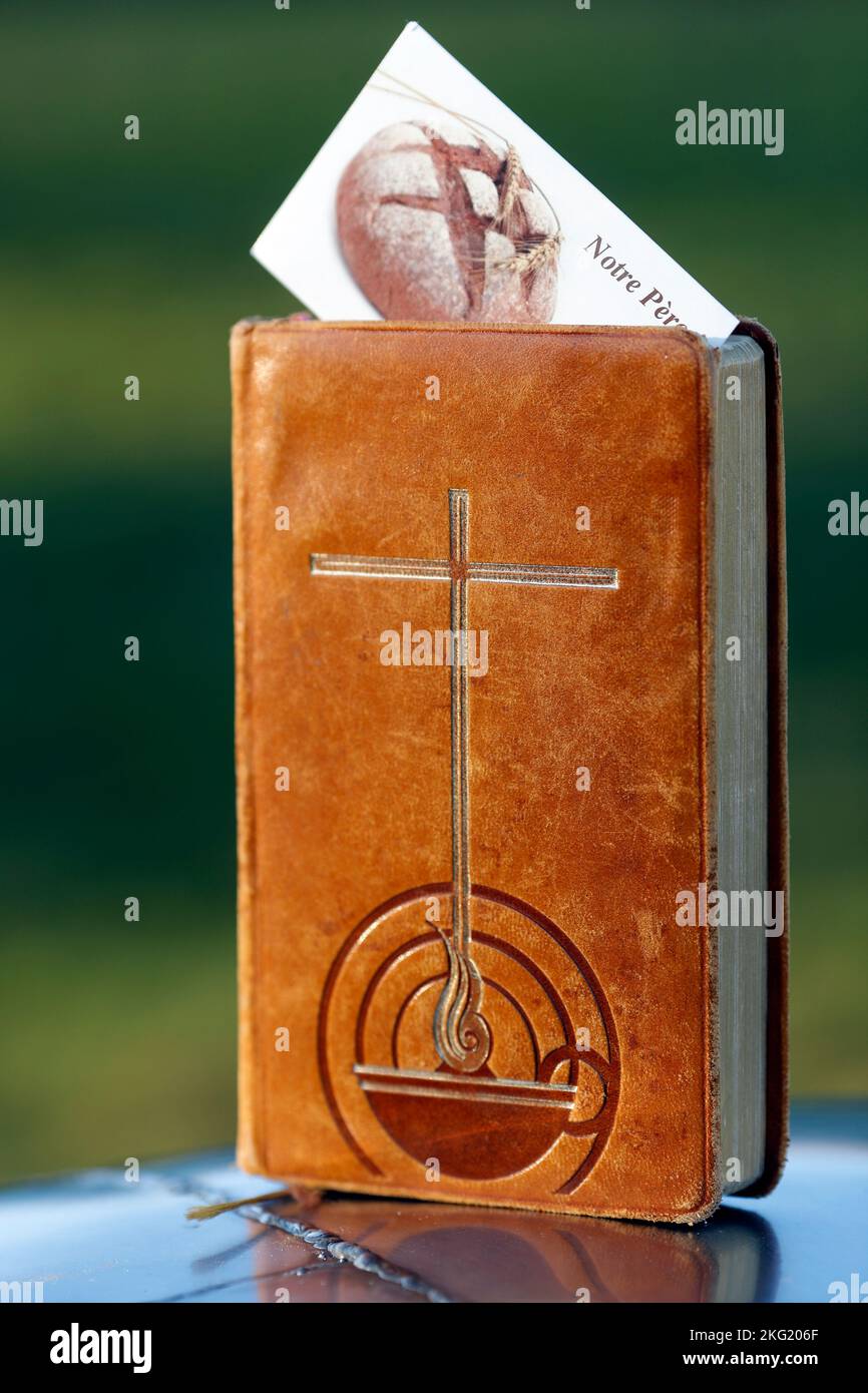 Old bible brown leather cover with cross Stock Photo Alamy
