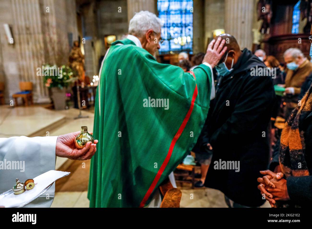 Sunday mass in Saint Philippe du Roule catholic church, Paris. Sacrament : anointing of the sick Stock Photo