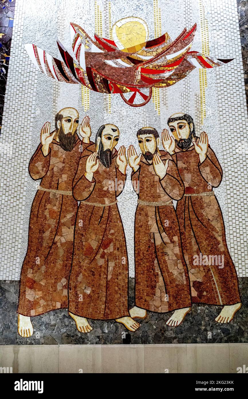 Lower church mosaic in the Padre Pio basilica, San Giovanni Rotondo, Italy. Saint Francis appears to his friars in a chariot of fire carrying the sun Stock Photo