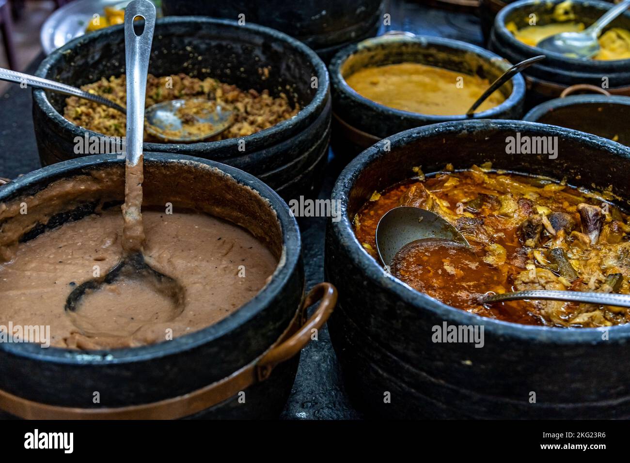 roast meat in a pot on the dinner table Stock Photo