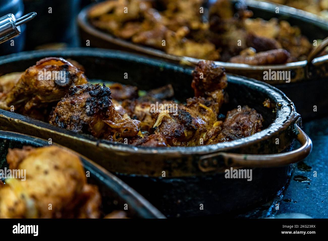 roast meat in a pot on the lunch table, self-service catering Stock Photo