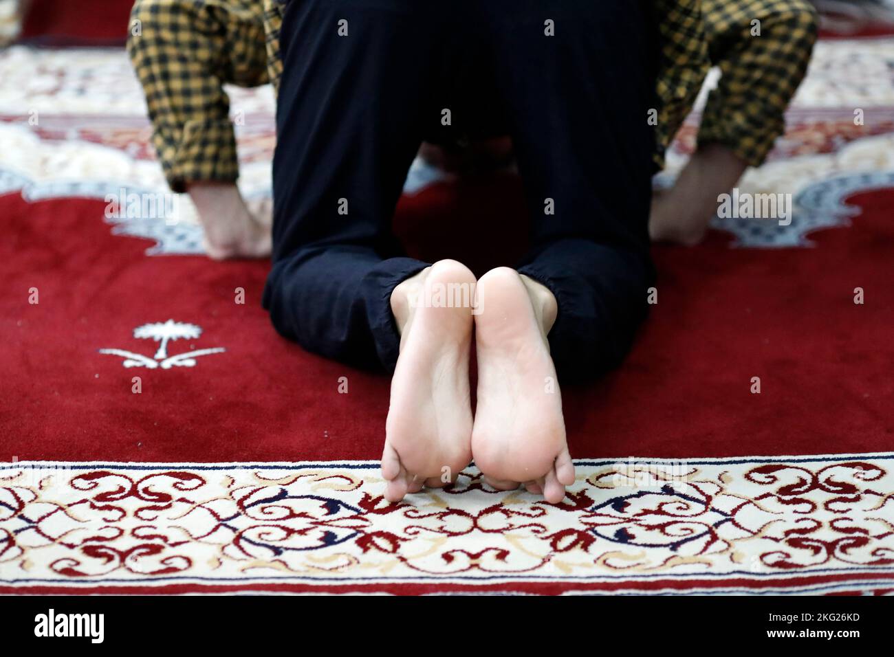 Muslim Praying On Knees