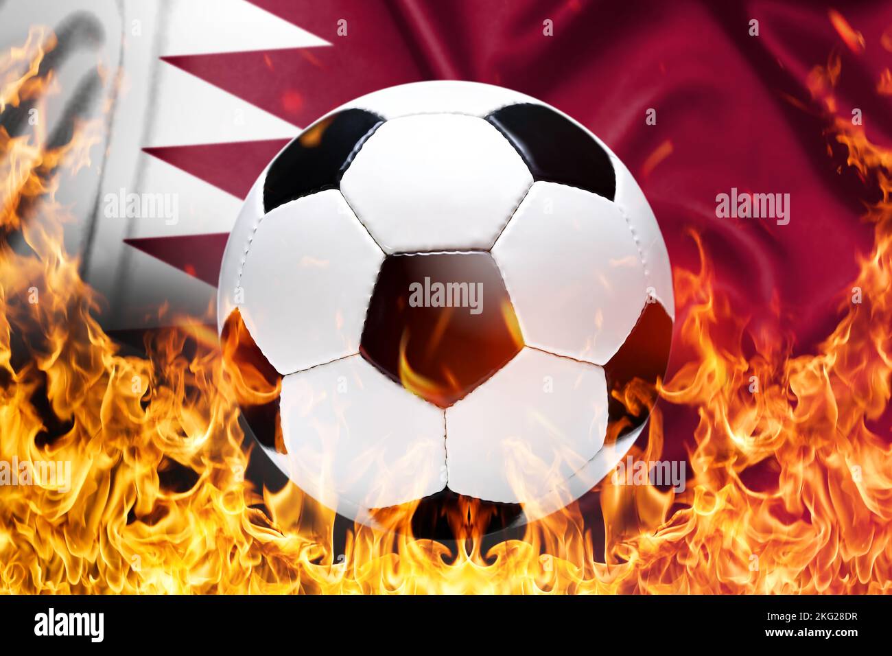 Soccer ball and flames in front of the flag of Qatar, boycott of the football world cup, symbolic image Stock Photo
