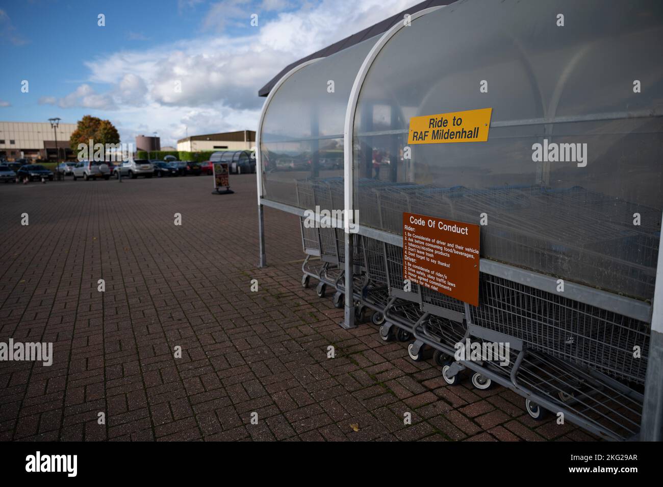 A commissary cart shelter displays a “Ride to RAF Mildenhall” sign on