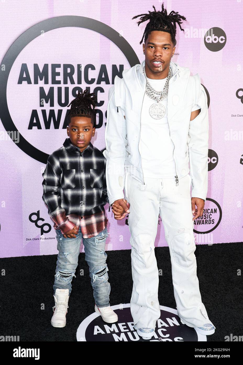LOS ANGELES, CALIFORNIA, USA - NOVEMBER 20: Jason Jones and Lil Baby (Dominique Armani Jones) arrive at the 2022 American Music Awards (50th Annual American Music Awards) held at Microsoft Theater at L.A. Live on November 20, 2022 in Los Angeles, California, United States. (Photo by Xavier Collin/Image Press Agency) Stock Photo