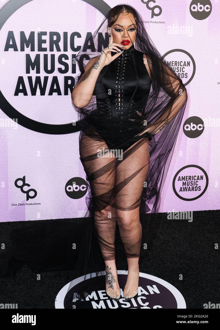 LOS ANGELES, CALIFORNIA, USA - NOVEMBER 20: Latto (Alyssa Michelle Stephens) arrives at the 2022 American Music Awards (50th Annual American Music Awards) held at Microsoft Theater at L.A. Live on November 20, 2022 in Los Angeles, California, United States. (Photo by Xavier Collin/Image Press Agency) Stock Photo