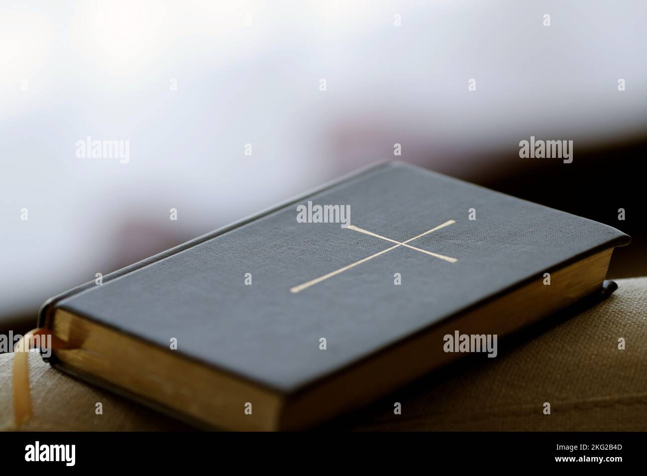 The Holy bible on a chair Stock Photo Alamy