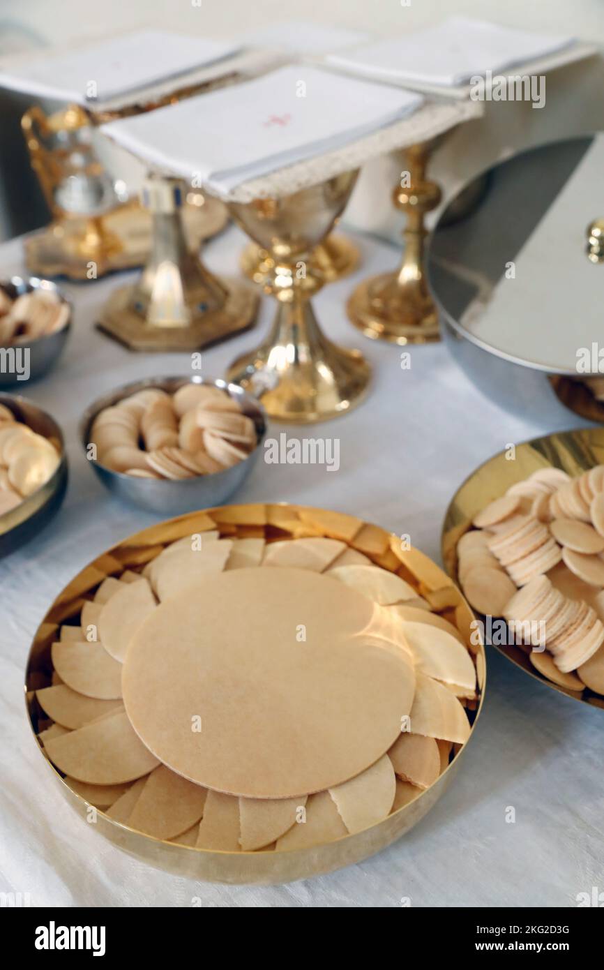 Catholic mass. Eucharist table with the liturgical items. Communion